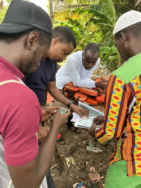 Abiola working with the locals