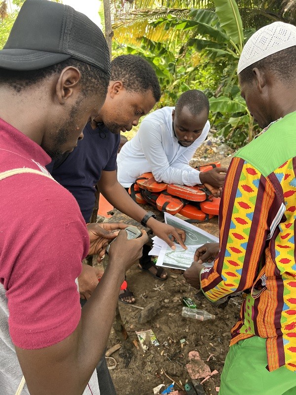 Abiola working with the locals