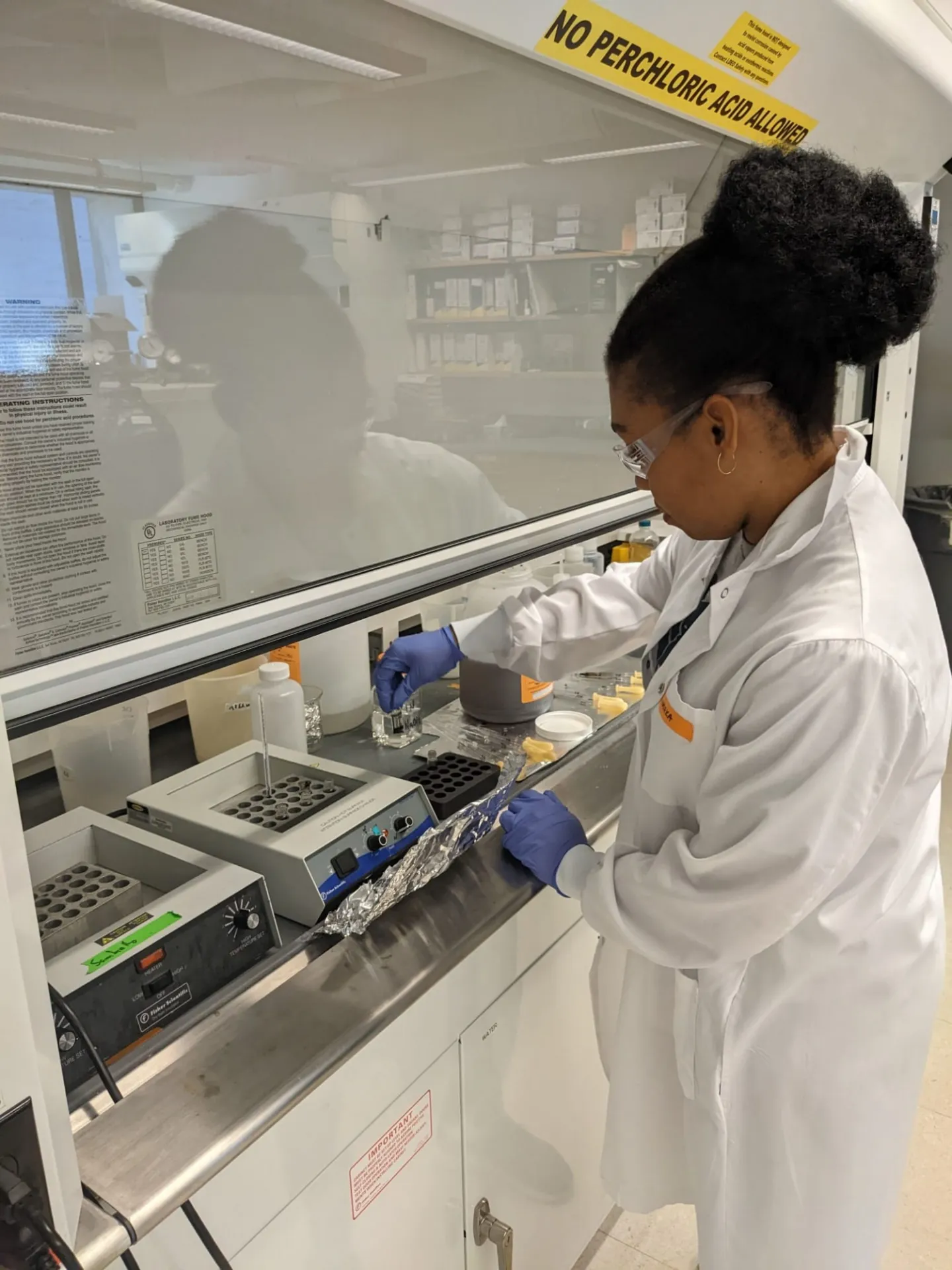 Chiamaka processing charcoal samples for radiocarbon dating