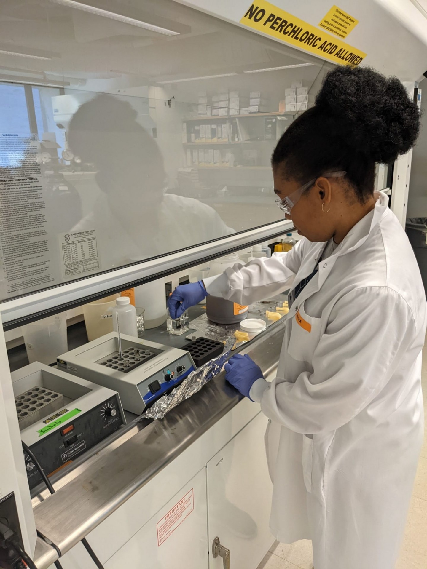 Chiamaka processing charcoal samples for radiocarbon dating